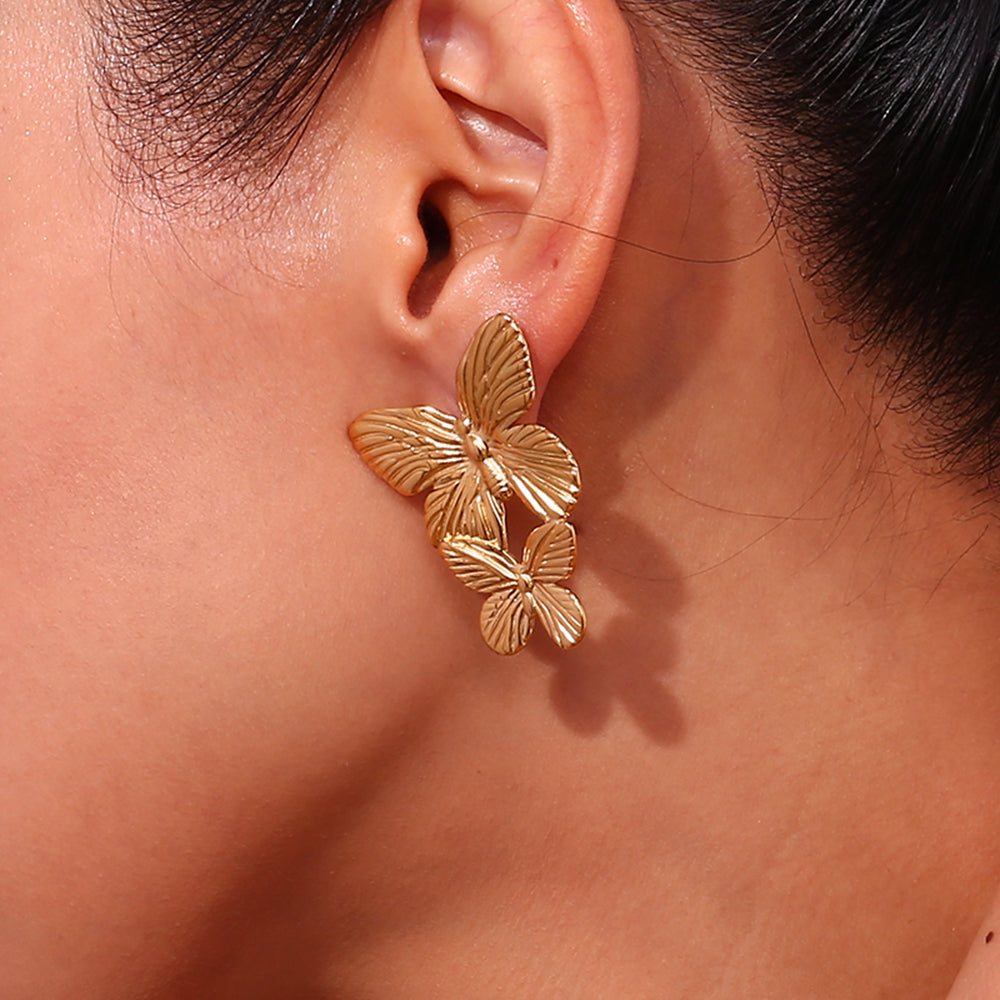 pendientes mariposa de acero inoxidable hipoalergenico